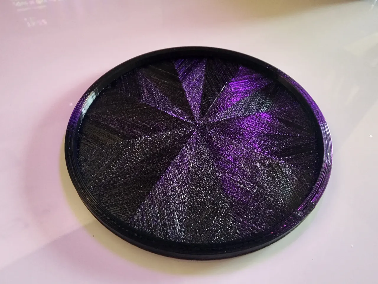 Posavasos rotondo con bordo rialzato